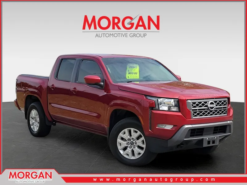 2023 Nissan Frontier SV in Red — front three-quarter view