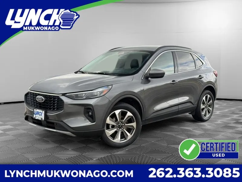 2025 Ford Escape Platinum in Carbonized Grey Metallic — front three-quarter view