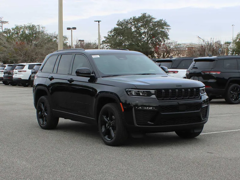 2026 Jeep Grand Cherokee Limited in Diamond Black Crystal Pearl-Coat Exterior Paint — front three-quarter view
