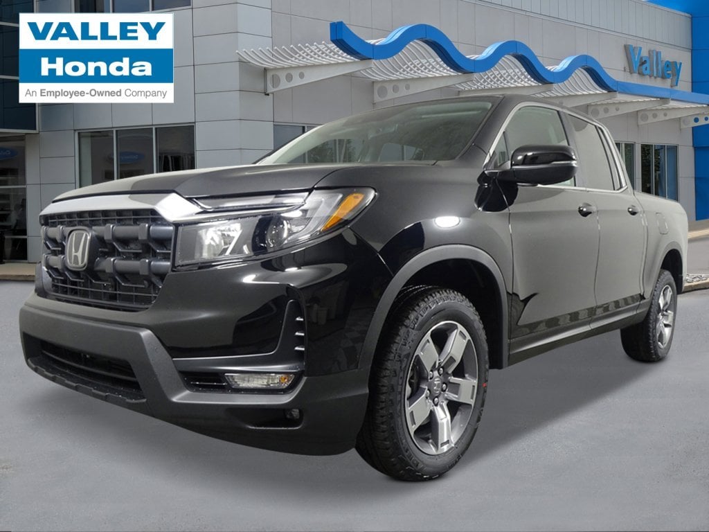 2026 Honda Ridgeline RTL in Crystal Black Pearl — front three-quarter view