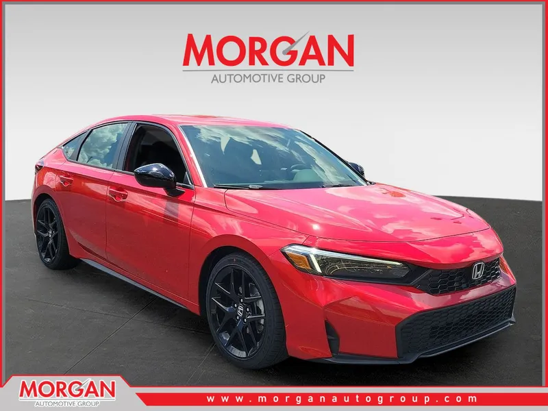 2026 Honda Civic Hatchback Sport in Rallye Red — front three-quarter view