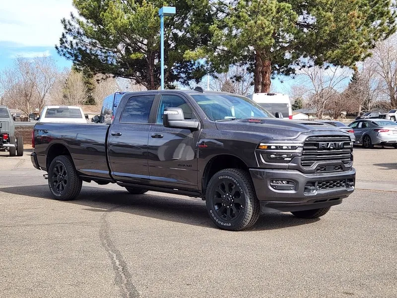 2026 RAM 3500 RAM 3500 LARAMIE CREW CAB 4X4 8' BOX in Granite Crystal Metallic Clear-Coat Exterior Paint — front three-quarter view