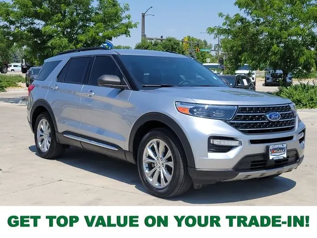 2020 Ford Explorer XLT in Iconic Silver Metallic — front three-quarter view