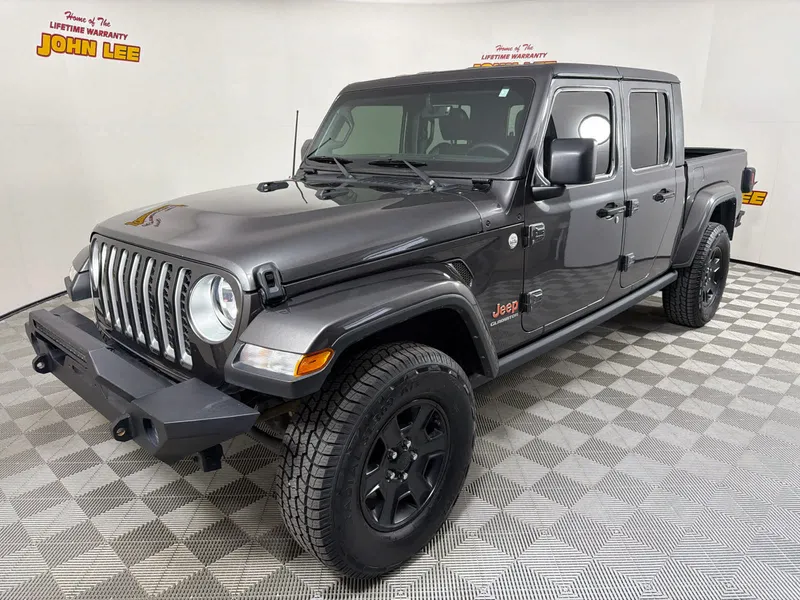 2021 Jeep Gladiator Overland in Granite Crystal Metallic Clearcoat — front three-quarter view