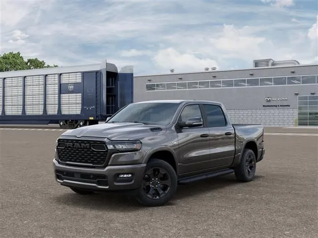 2026 RAM Ram 1500 RAM 1500 BIG HORN CREW CAB 4X4 5'7' BOX in Granite Crystal Metallic Clear-Coat Exterior Paint — front three-quarter view