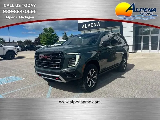 2026 GMC Yukon AT4 in Midnight Pine — front three-quarter view