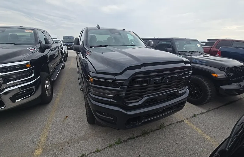 2025 RAM 2500 Big Horn Crew Cab 4x4 6'4' Box in Forged Blue Metallic — front three-quarter view