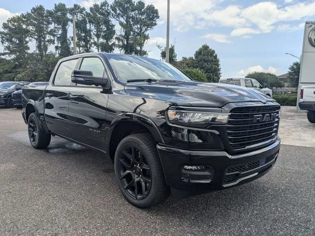 2026 RAM 1500 Laramie in Diamond Black Crystal Pearl-Coat Exterior Paint — front three-quarter view