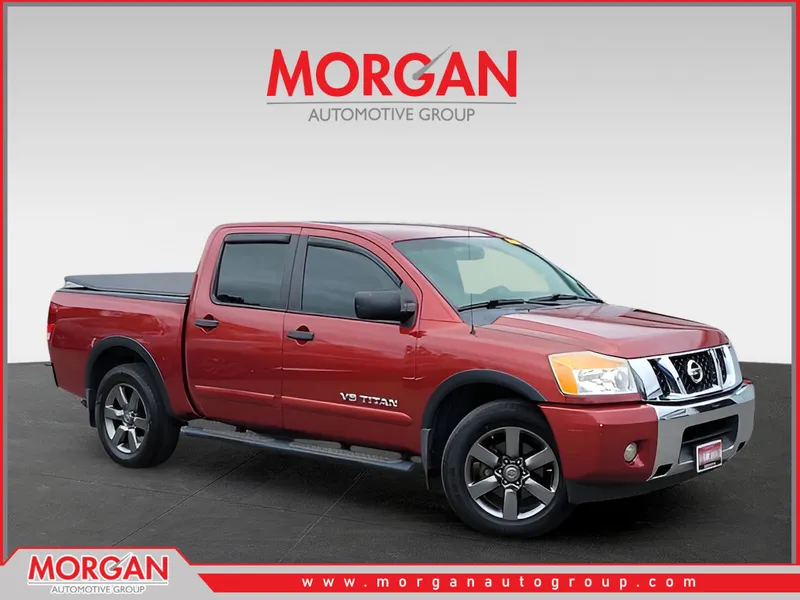 2015 Nissan Titan SV in Red — front three-quarter view