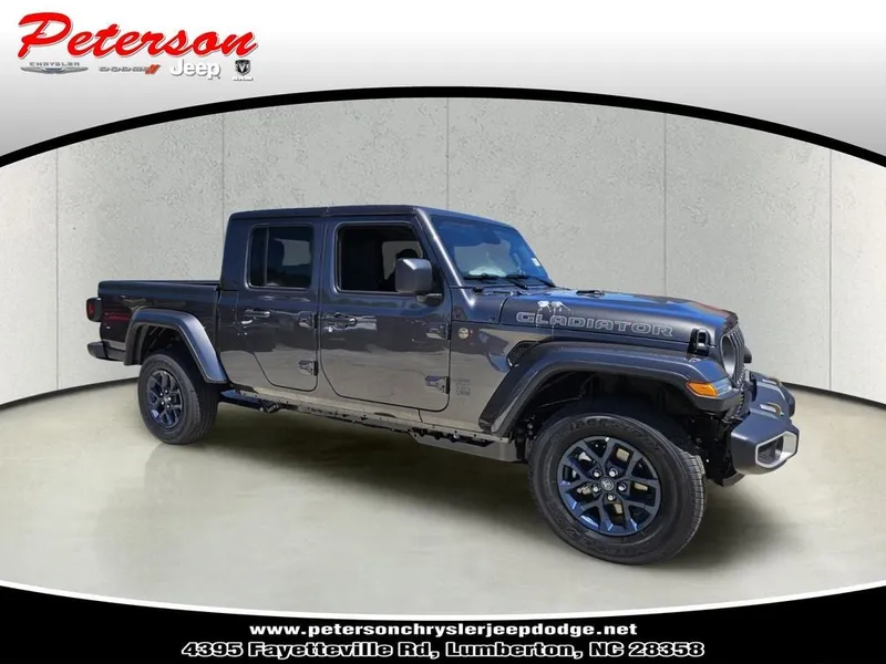 2026 Jeep Gladiator GLADIATOR 85TH ANNIVERSARY EDITION 4X4 in Granite Crystal Metallic Clear-Coat Exterior Paint — front three-quarter view