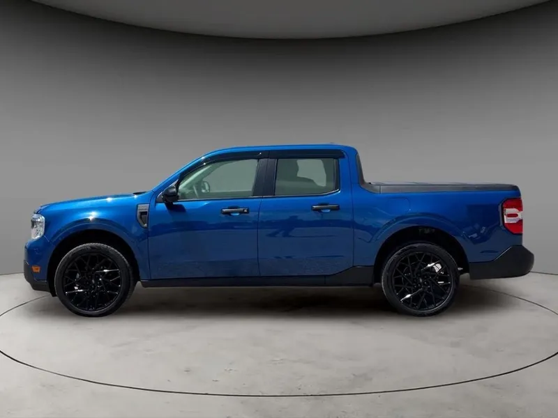 2024 Ford Maverick XLT in Atlas Blue Metallic — front three-quarter view