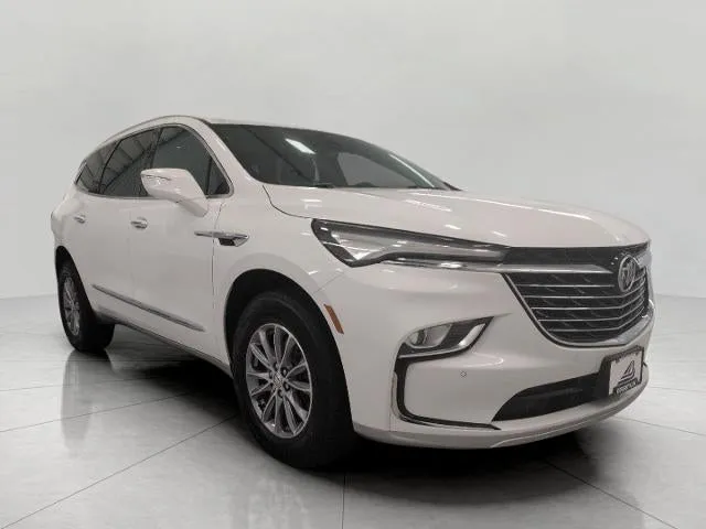 2023 Buick Enclave Essence in Summit White — front three-quarter view