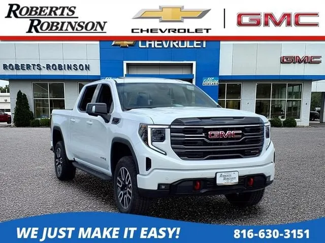 2026 GMC Sierra 1500 AT4 in Summit White — front three-quarter view