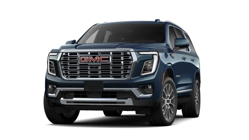 2026 GMC Yukon Denali in Downpour Metallic — front three-quarter view