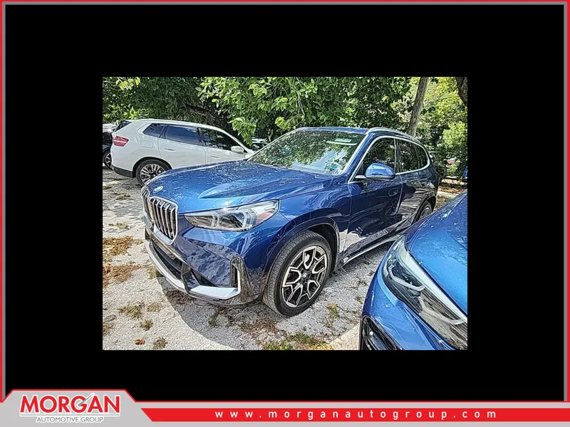 2025 BMW X1 xDrive28i in Phytonic Blue Metallic — front three-quarter view