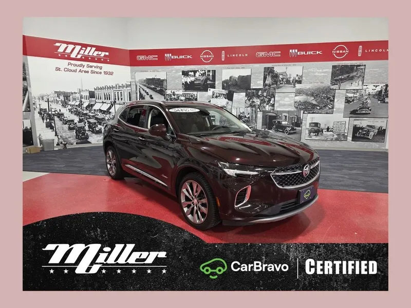2021 Buick Envision Avenir CarBravo Certified in Rich Garnet Metallic — front three-quarter view