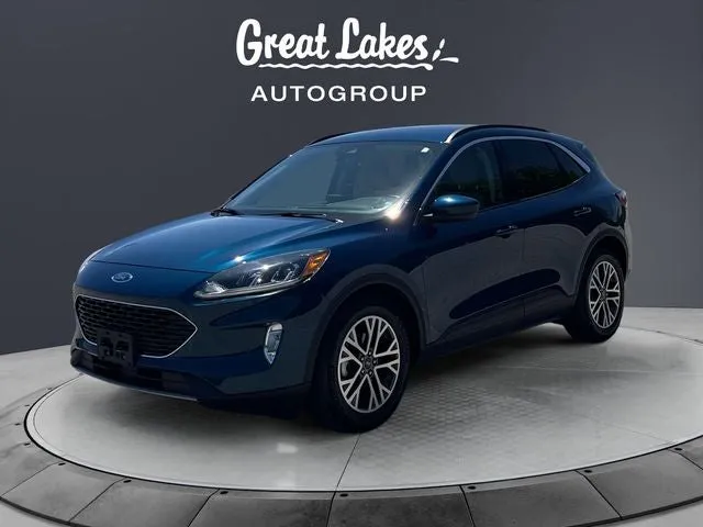 2020 Ford Escape SEL in Dark Persian Green Metallic — front three-quarter view