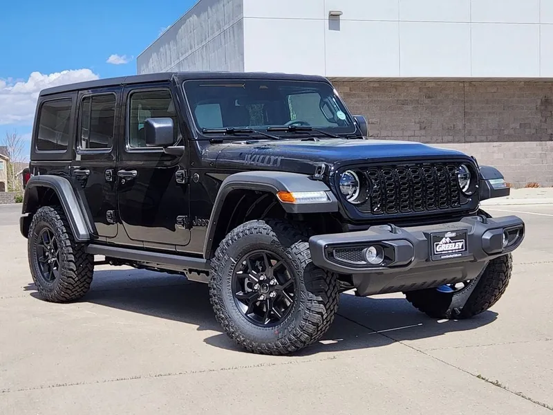 2026 Jeep Wrangler WRANGLER 4-DOOR WILLYS in Black Clear-Coat Exterior Paint — front three-quarter view