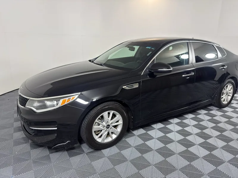 2018 Kia Optima LX in Black — front three-quarter view