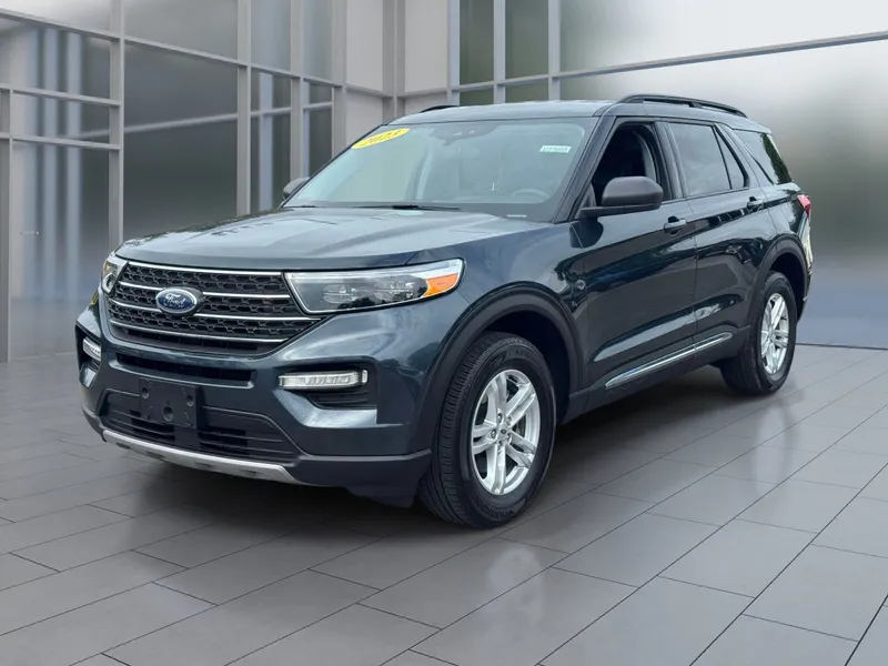 2023 Ford Explorer XLT in Blue Metallic — front three-quarter view