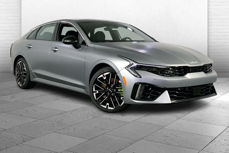 2026 Kia K5 GT in Steel Matte Gray — front three-quarter view