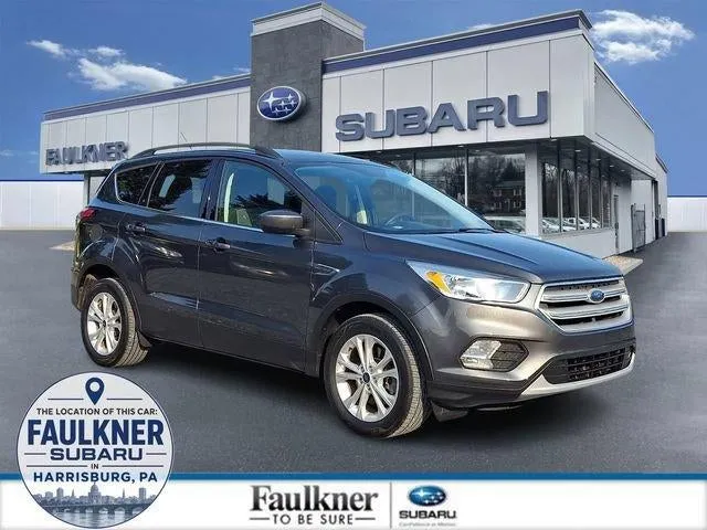 2018 Ford Escape SE 4WD in Magnetic Metallic — front three-quarter view