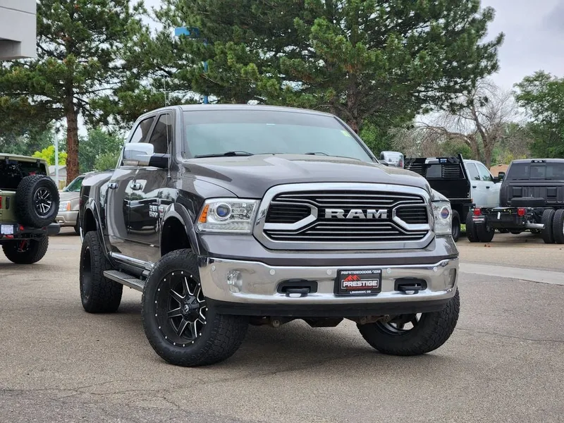 2017 RAM 1500 Limited Crew Cab 4x4 5'7' Box in Granite Crystal Metallic Clearcoat — front three-quarter view