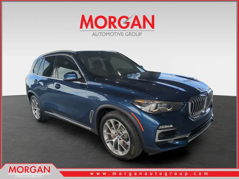 2021 BMW X5 xDrive40i in Phytonic Blue Metallic — front three-quarter view