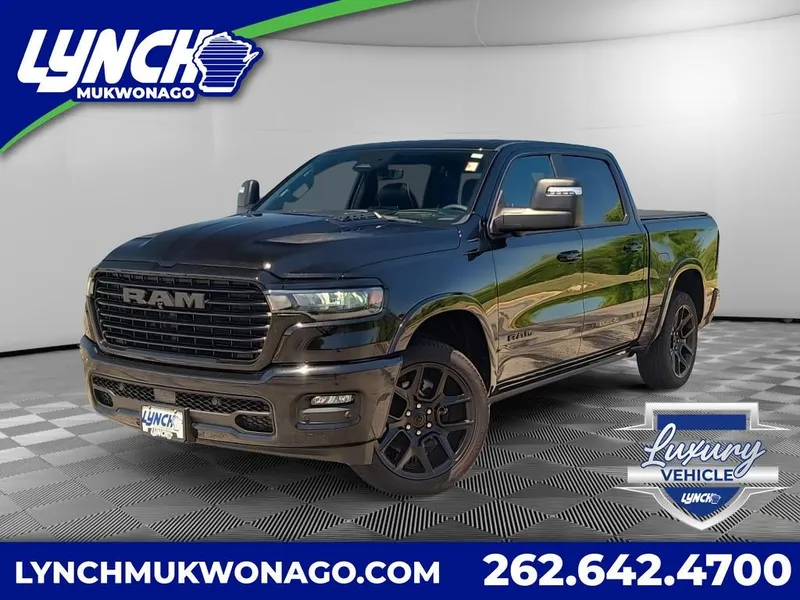 2025 RAM 1500 Laramie in Diamond Black Crystal Pearlcoat — front three-quarter view