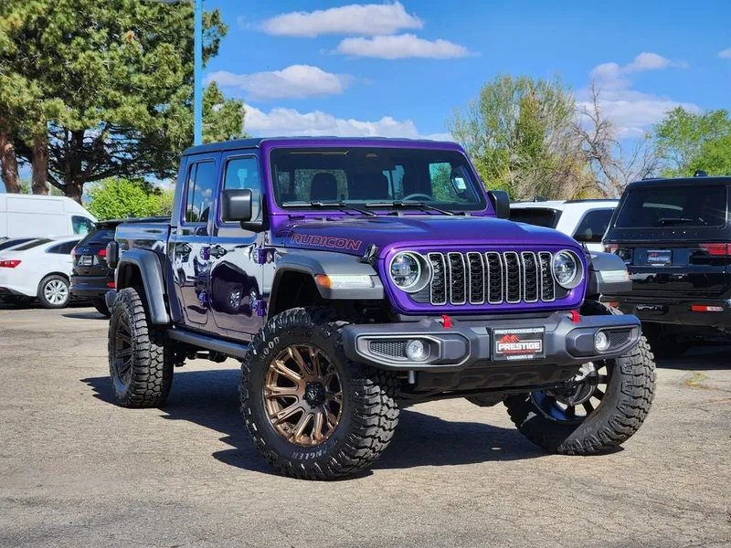 2026 Jeep Gladiator GLADIATOR RUBICON 4X4 in Reign Exterior Paint — front three-quarter view
