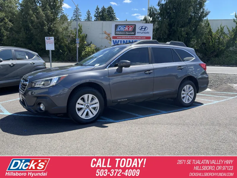 2019 Subaru Outback Premium in Magnetite Gray Metallic — front three-quarter view