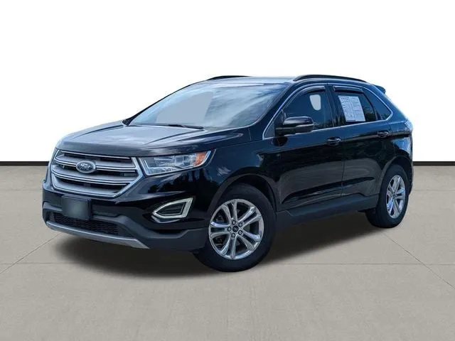 2018 Ford Edge SEL in Shadow Black — front three-quarter view