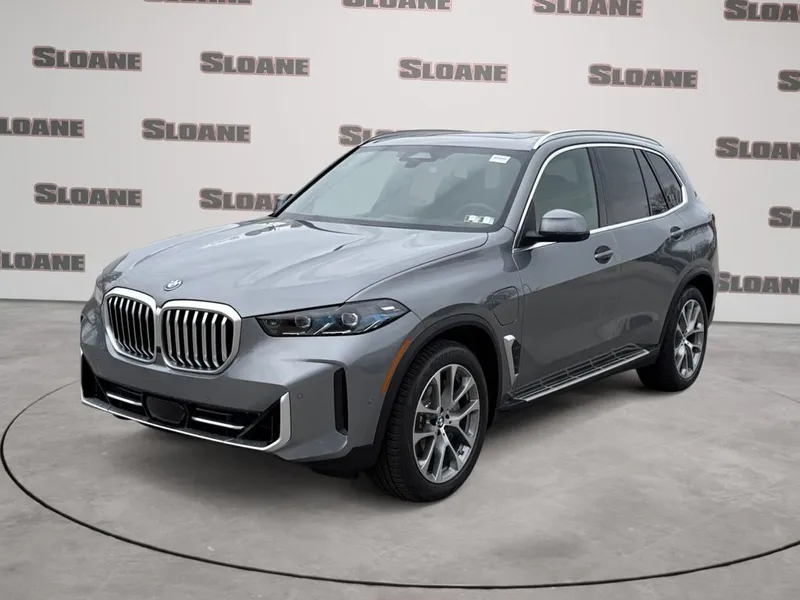 2026 BMW X5 xDrive50e in Skyscraper Grey Metallic — front three-quarter view