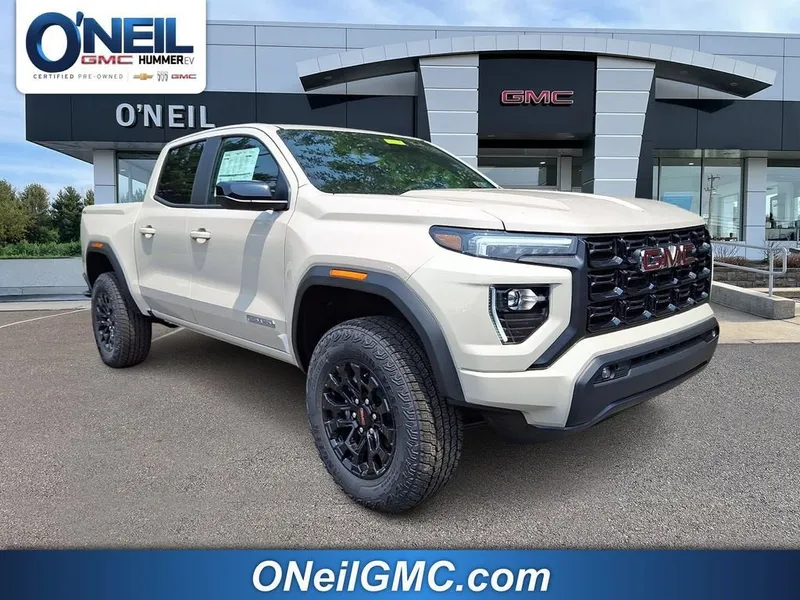 2026 GMC Canyon Elevation in Coastal Dune — front three-quarter view