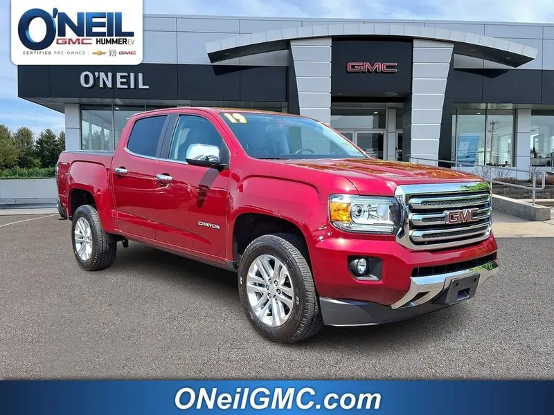 2019 GMC Canyon 4WD SLT in Red Quartz Tintcoat — front three-quarter view