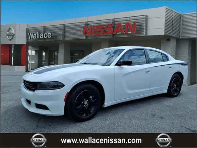 2023 Dodge Charger SXT in White Knuckle Clearcoat — front three-quarter view