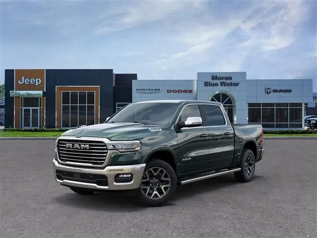 2026 RAM Ram 1500 RAM 1500 LARAMIE CREW CAB 4X4 5'7' BOX in Serrano-Green Metallic Exterior Paint — front three-quarter view