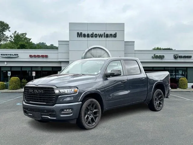 2026 RAM 1500 Laramie in Forged Blue Metallic Exterior Paint — front three-quarter view