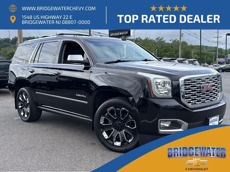 2018 GMC Yukon Denali in Onyx Black — front three-quarter view
