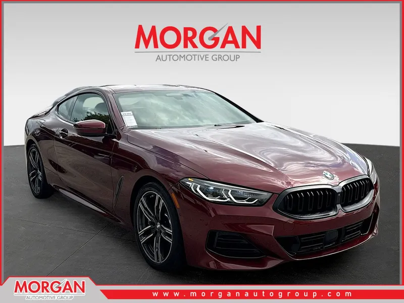2023 BMW 8 Series 840i in Aventurin Red Metallic — front three-quarter view