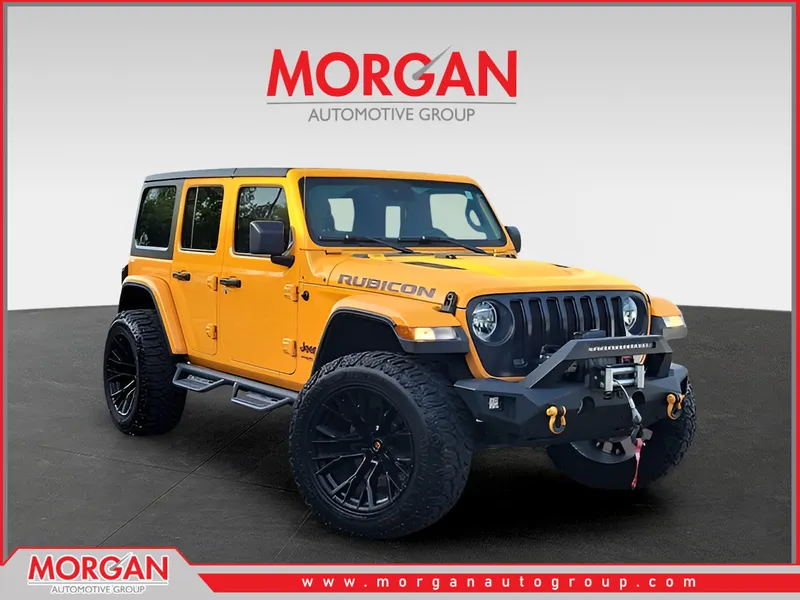 2021 Jeep Wrangler Unlimited Rubicon in Orange — front three-quarter view