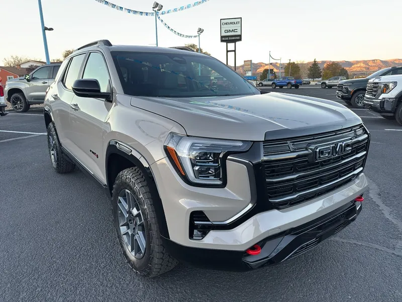 2026 GMC Terrain AT4 in Riverstone Metallic — front three-quarter view