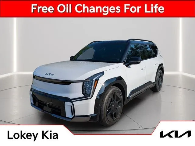 2026 Kia EV9 GT-Line in Glacial White Pearl/Ebony Black Roof — front three-quarter view