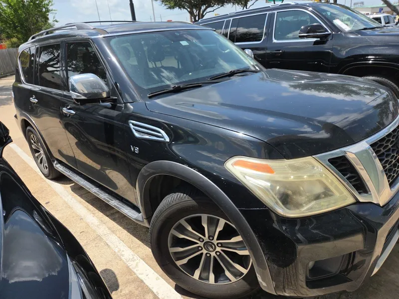 2018 Nissan Armada SL in Super Black — front three-quarter view