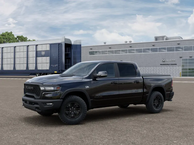 2026 RAM 1500 Rebel in Diamond Black Crystal Pearlcoat — front three-quarter view