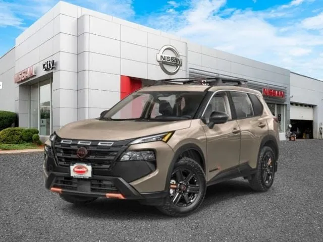 2026 Nissan Rogue Rock Creek in Baja Storm Metallic — front three-quarter view