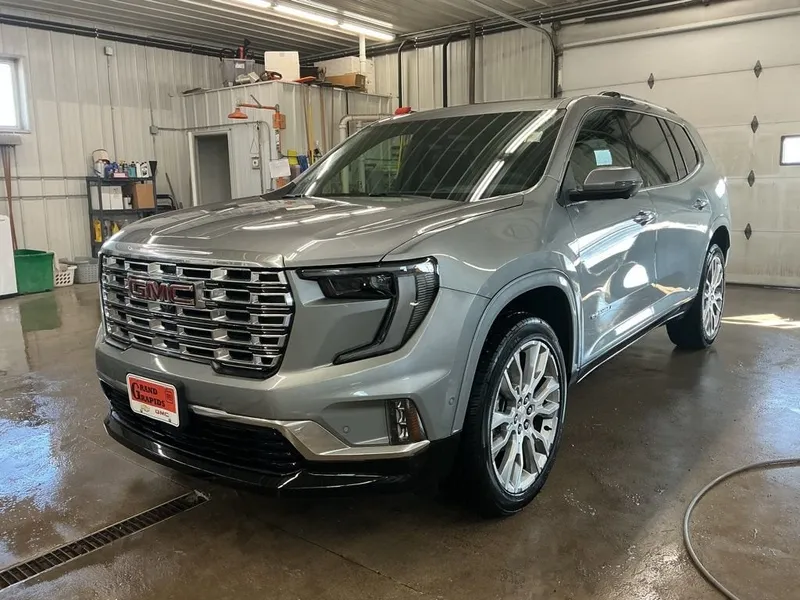 2026 GMC Acadia Denali in Sterling Metallic — front three-quarter view