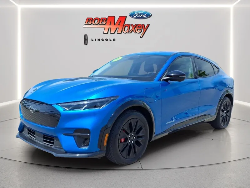2025 Ford Mustang Mach-E Premium in Blue Metallic — front three-quarter view