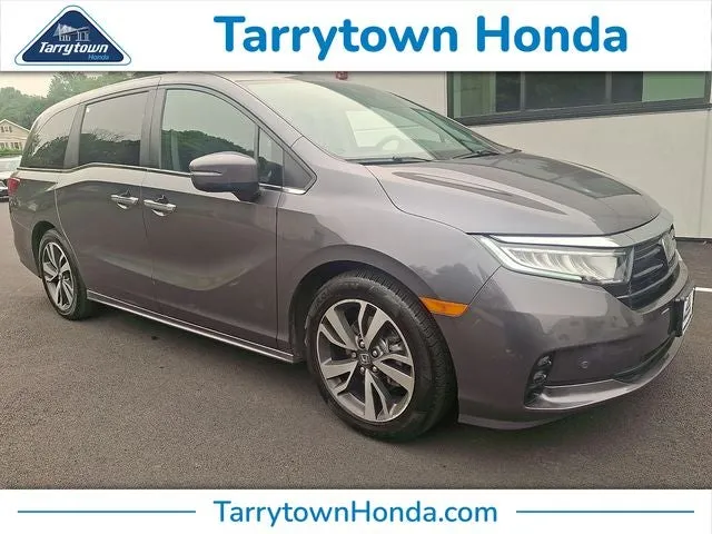 2024 Honda Odyssey Touring in Modern Steel Metallic — front three-quarter view