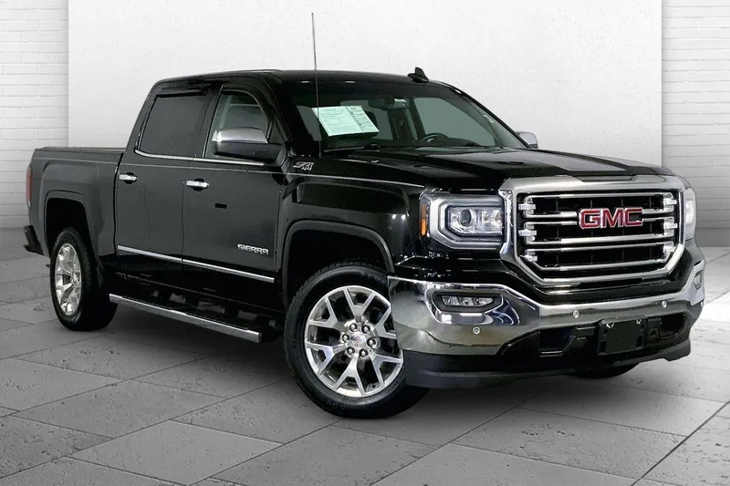 2018 GMC Sierra 1500 SLT in Onyx Black — front three-quarter view